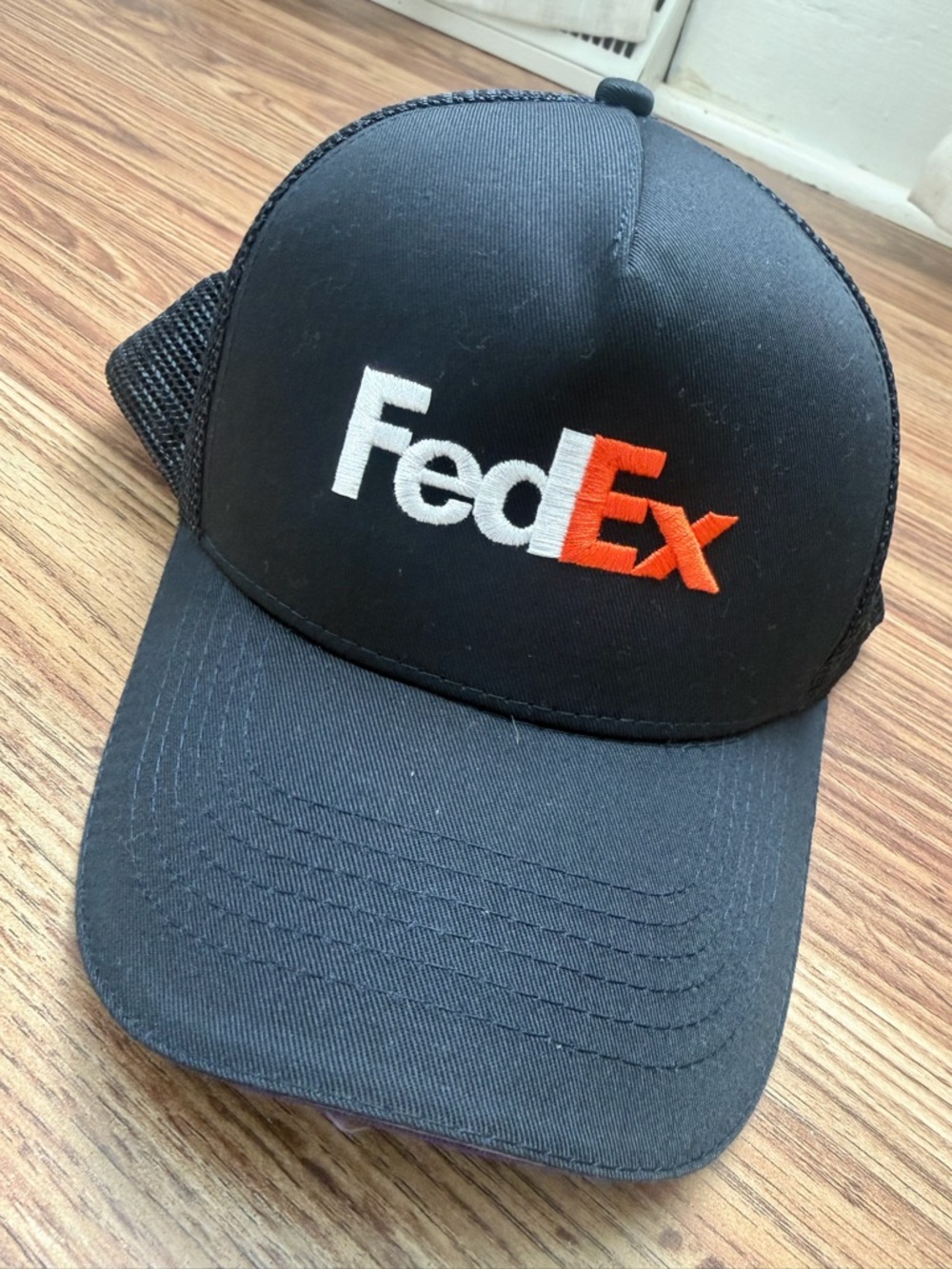 FedEx Black Logo Trucker Hat - Black with White & Orange Logo